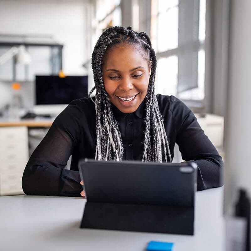 Black woman employee on video conference call