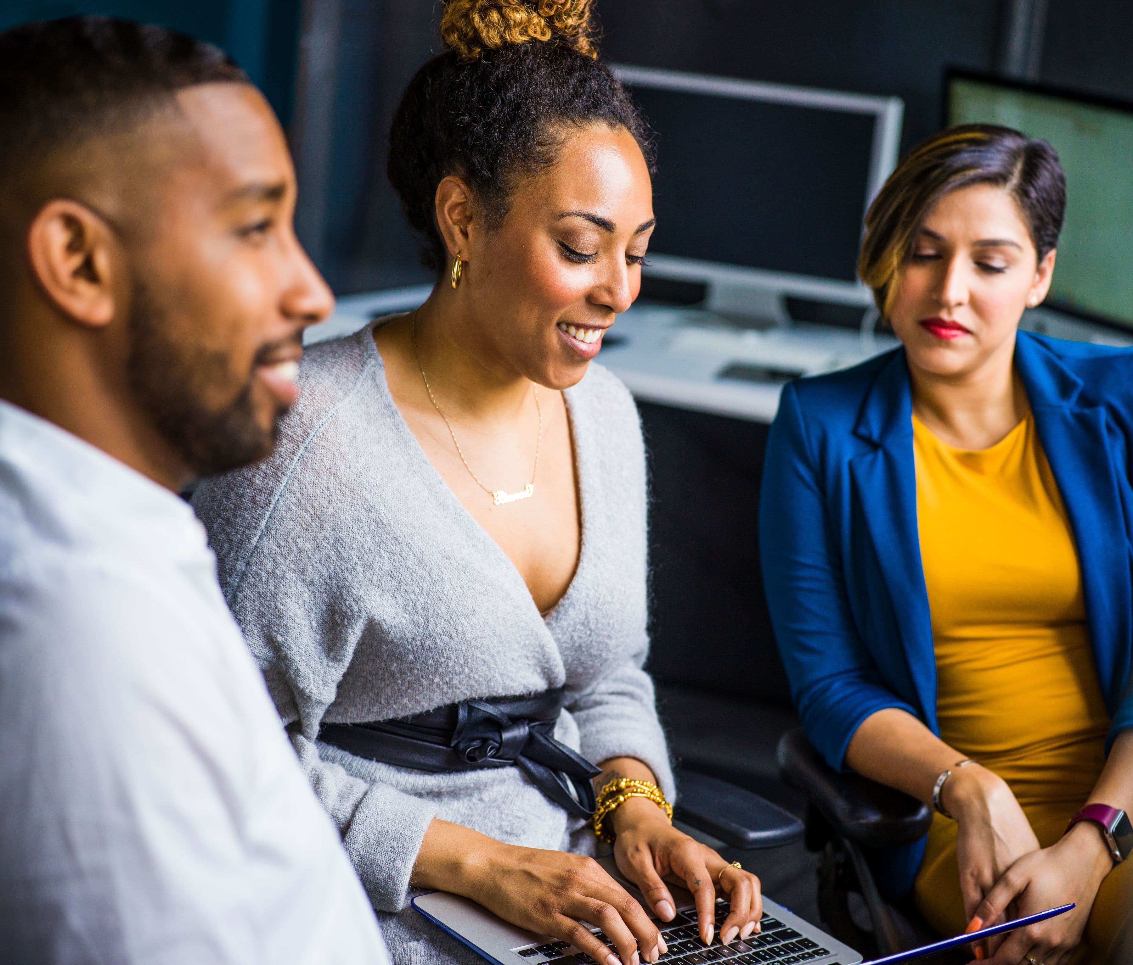 a happy team of workers, empowerment - employee engagement strategy