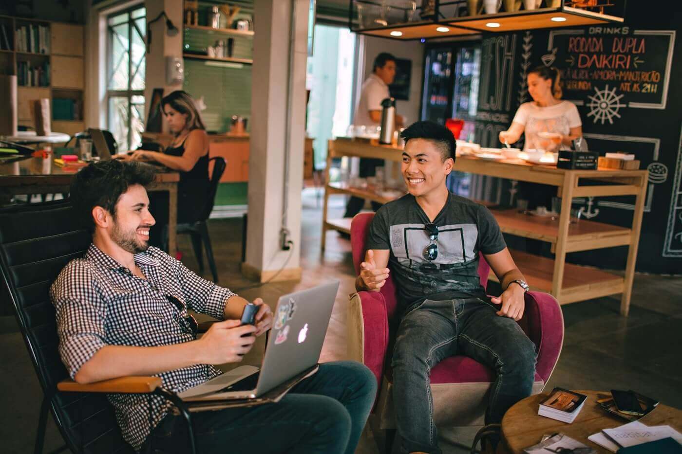 Colleagues sitting together in a coffee shop